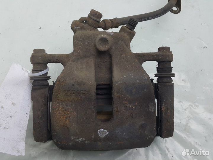 Суппорт тормозной передний левый Suzuki Sx 4