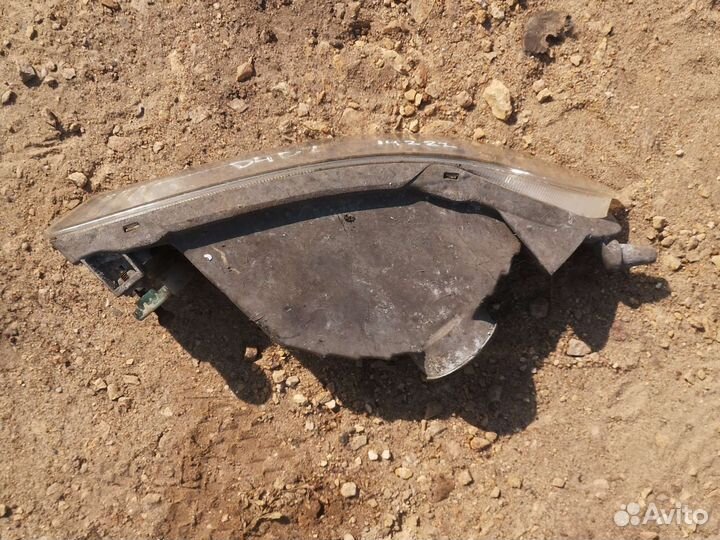 Противотуманка L Corolla