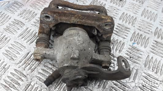 Суппорт тормозной задний правый KIA CEE'D 2 (JD)