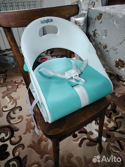 Стульчик бустер babyton для кормления