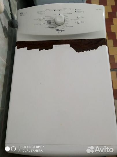 Стиральная машина с вертикальной загрузкой