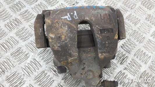 Суппорт тормозной передний правый mazda 3 1 (7LV28