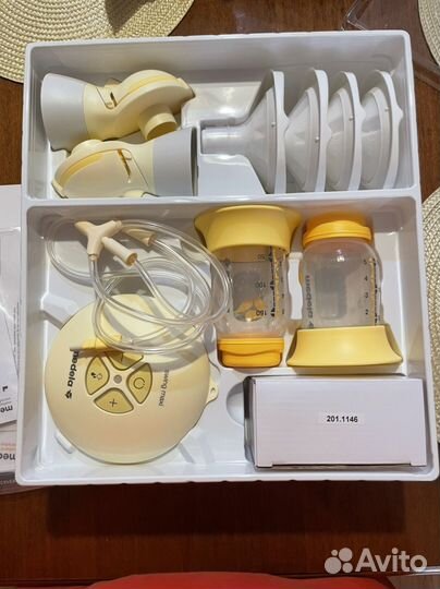 Молокоотсос medela swing maxi flex