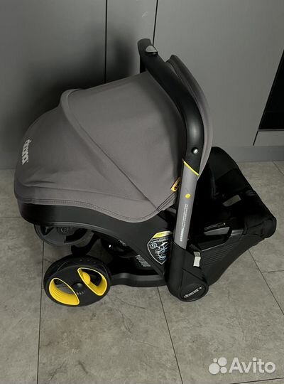 Коляска автокресло doona с базой isofix