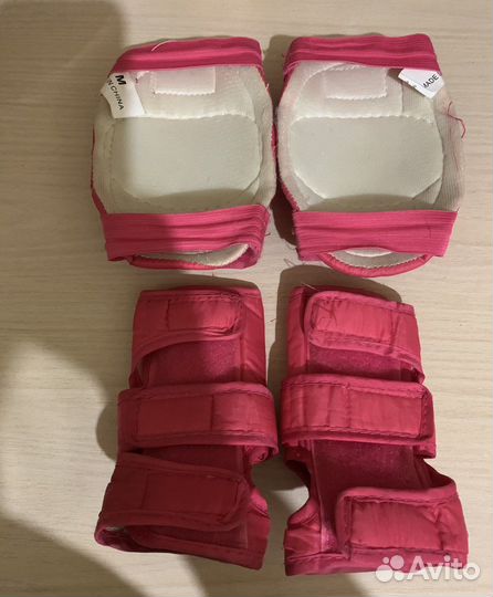 Роликовые коньки