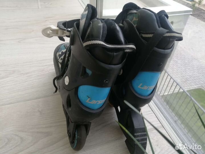 Роликовые коньки