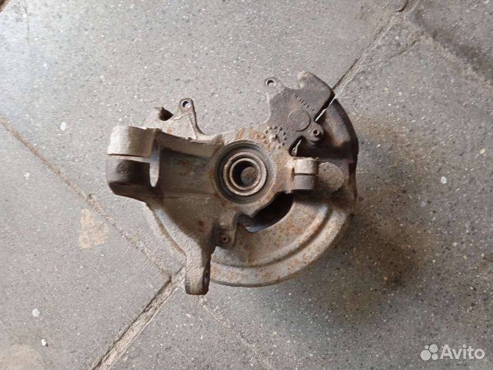 Поворотный кулак передний левый Ford Taurus 1 Форд