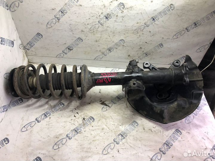 Стойка амортизатора bmw e 34 передняя левая