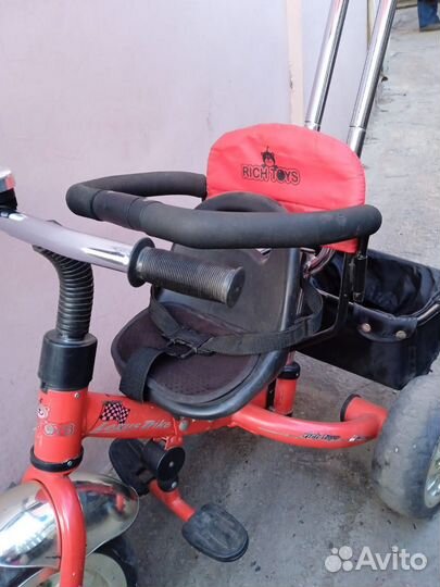 Трёхколёсный велосипед с родительским управлением