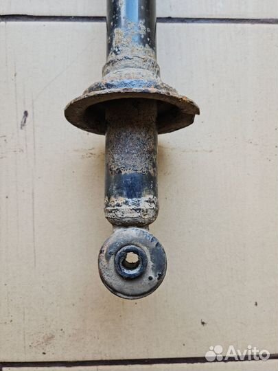 Стойка амортизатор задний Mitsubishi Lancer IX