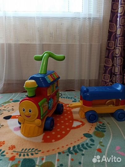 Паровозик музыкальный каталка
