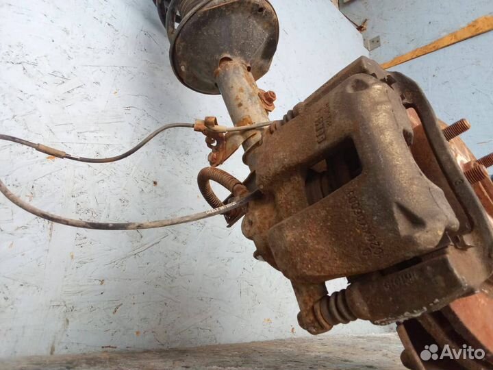 Суппорт тормозной передний Geely Emgrand EC7