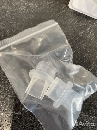 Молокоотсос ручной новый (и пакеты для молока)