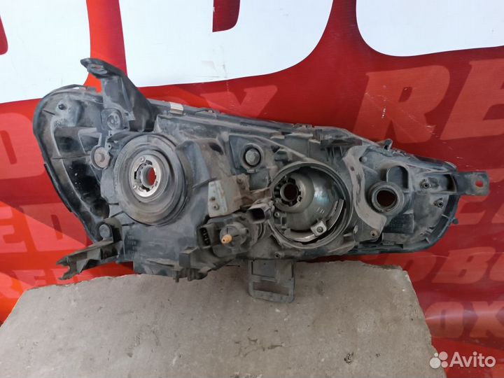 Фара левая Mitsubishi Lancer 10 8301C335