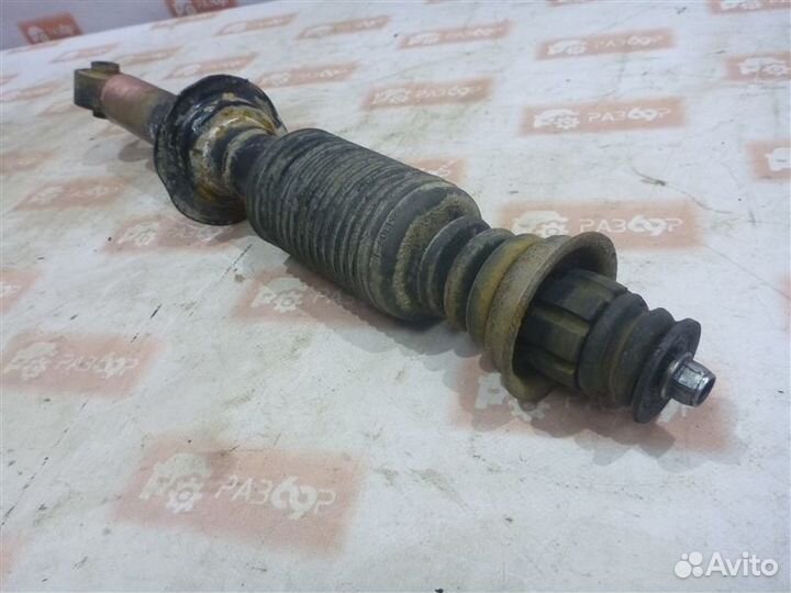 Амортизатор задний левый Nissan Almera Classic B10