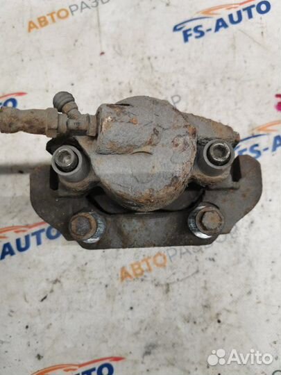 Суппорт тормозной передний левый Ford Fiesta MK5