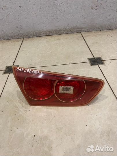 Фонарь задний левый (крышка багажника) Mitsubishi