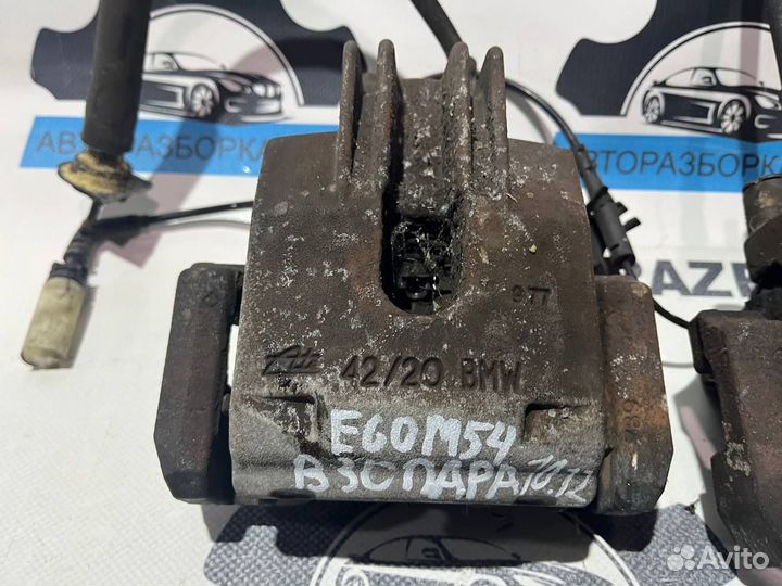 Суппорт тормозной задний левый правый BMW 5-серия