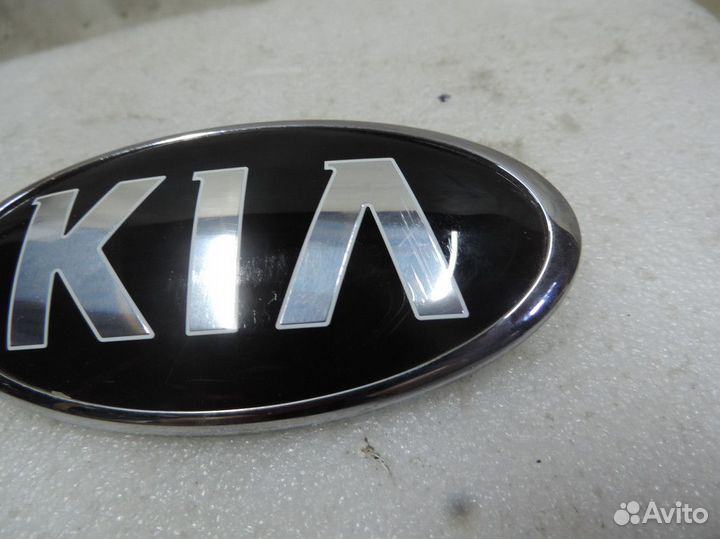 Эмблема переднего бампера Kia Sportage 2016