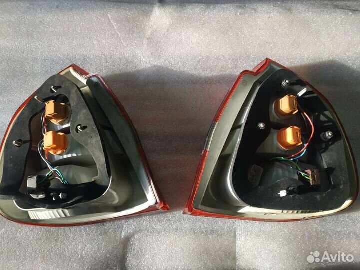 Фонарь задний левый Каризма