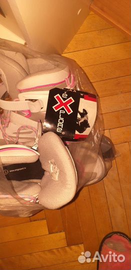 Роликовые коньки