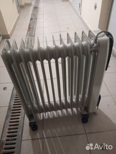 Масляный обогреватель delonghi