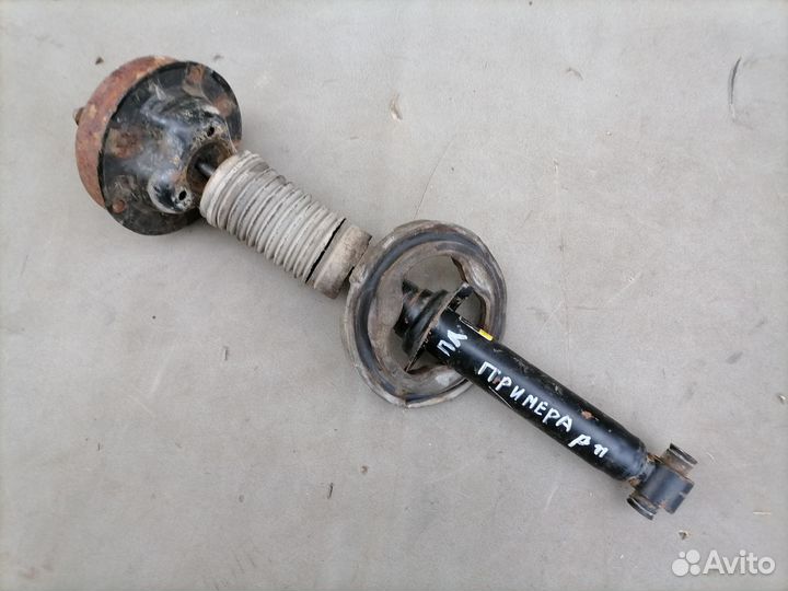 Амортизатор передний Nissan Primera P11E 1996-2002