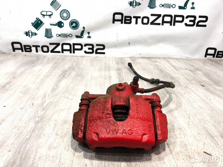 Суппорт тормозной передний левый Volkswagen Polo 5