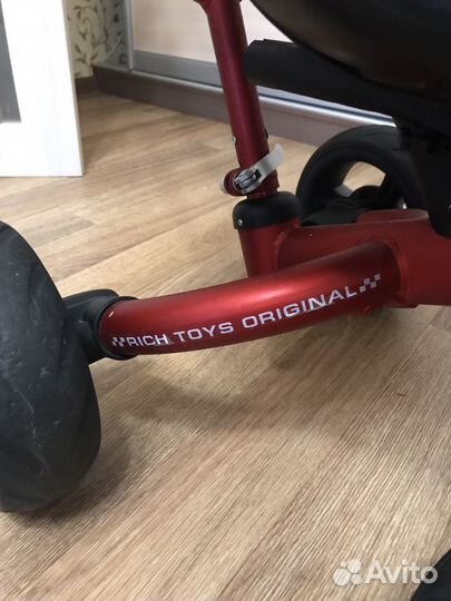 Трехколесный велосипед с ручкой