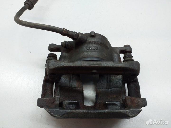 Суппорт тормозной передний левый Mercedes-Benz