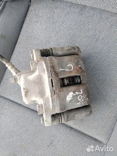 Тормозной суппорт на Логан 1.4