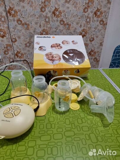 Двойной электр.Молокоотсос medela swing maxi flex