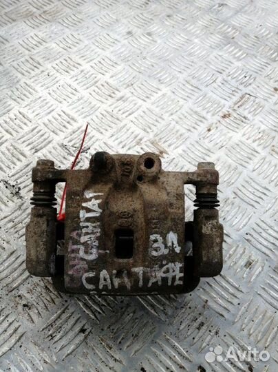 Суппорт задний левый Hyundai Santa Fe CM 2.2