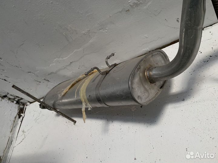 Глушитель на Шевроле сабурбан 2006г