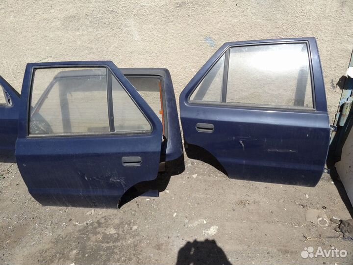 Шкода фелиция 1997 года двери