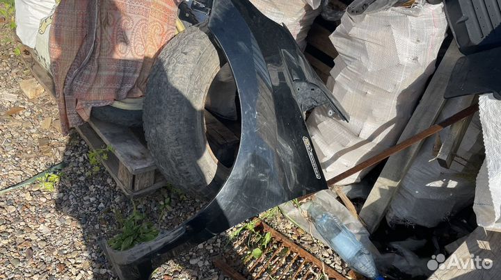 Крыло левое переднее honda fit