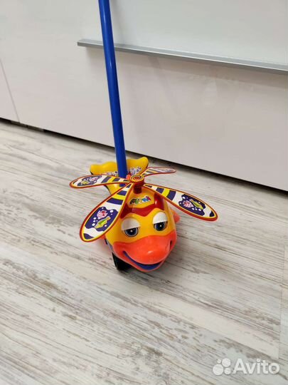 Игрушки для детей самолет и шар каталка ручная