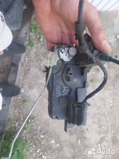 Замок левый передний Opel Astra h