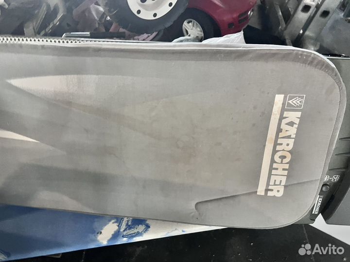 Гладильная доска с утюгом