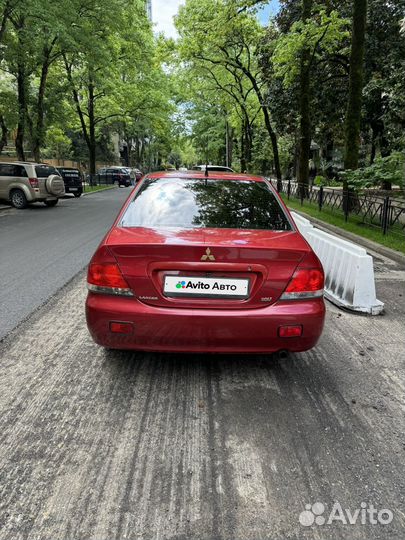 Mitsubishi Lancer 1.6 AT, 2004, 245 000 км