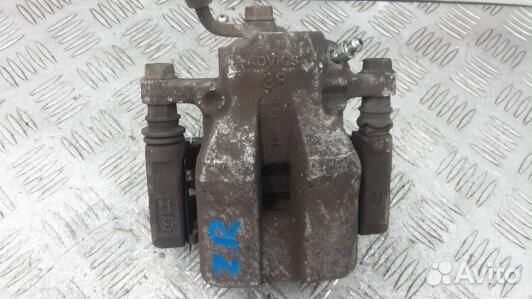 Суппорт тормозной задний правый toyota RAV 4 ZSA3