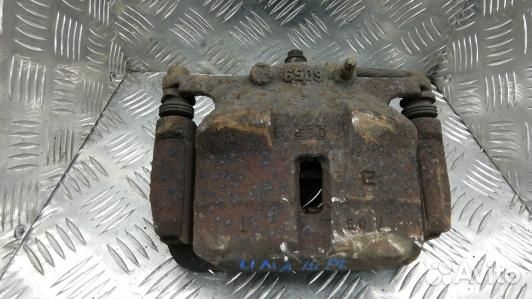 Суппорт тормозной передний левый nissan qashqai J1