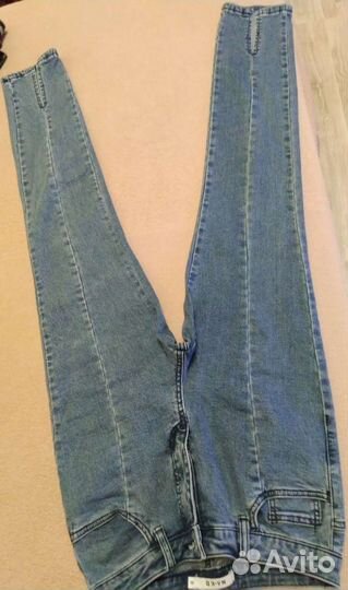 Джинсы новые,с разрезами