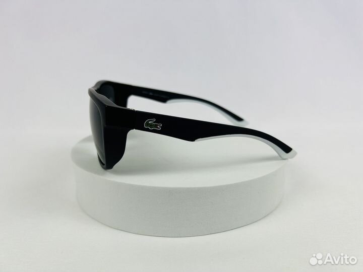 Солнцезащитные очки Lacoste