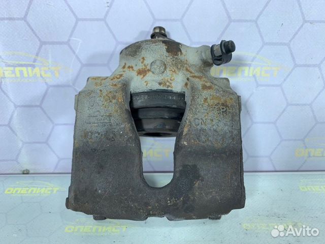 Суппорт тормозной передний левый Opel Astra G
