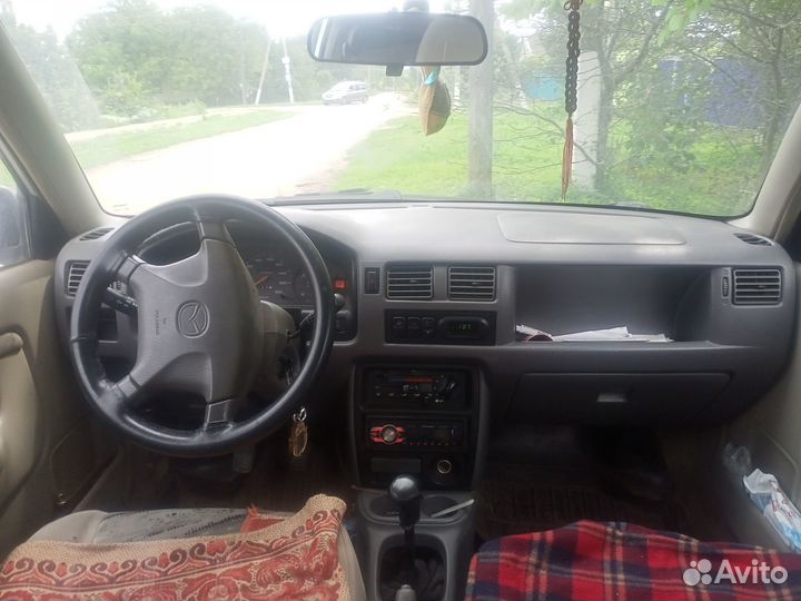 Mazda Demio, 1998