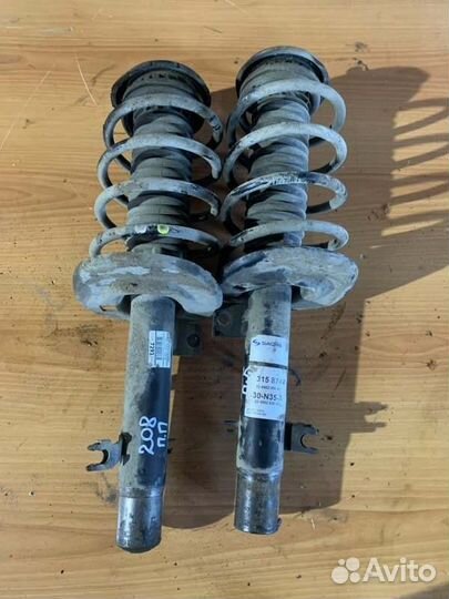 Амортизатор передний левый Peugeot 208 хетчбек 1.6