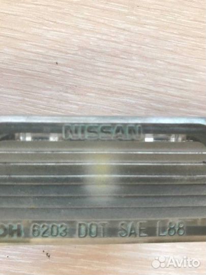 Фонарь подсветки номера Nissan Almera
