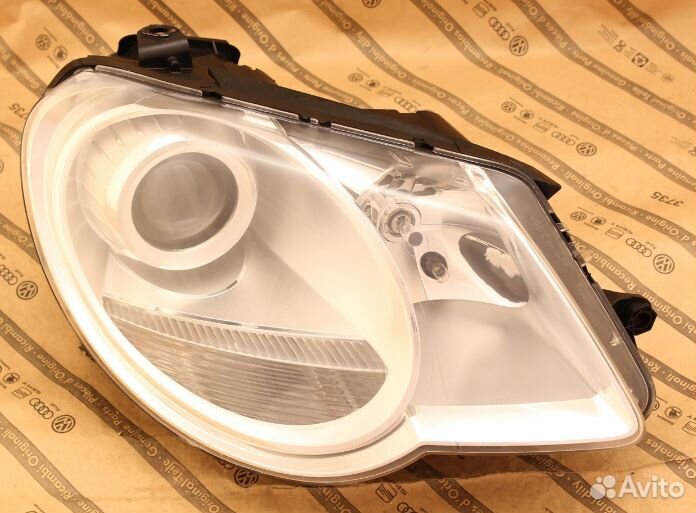 Фара правая VW EOS 05-10