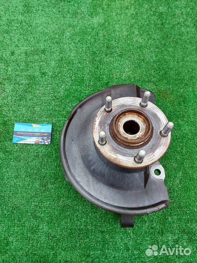 Кулак поворотный левый Mitsubishi Lancer X